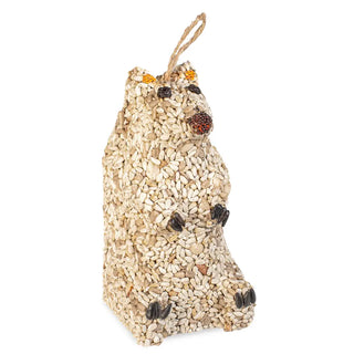 Bird seed sculpture shaped like a bear on a white background